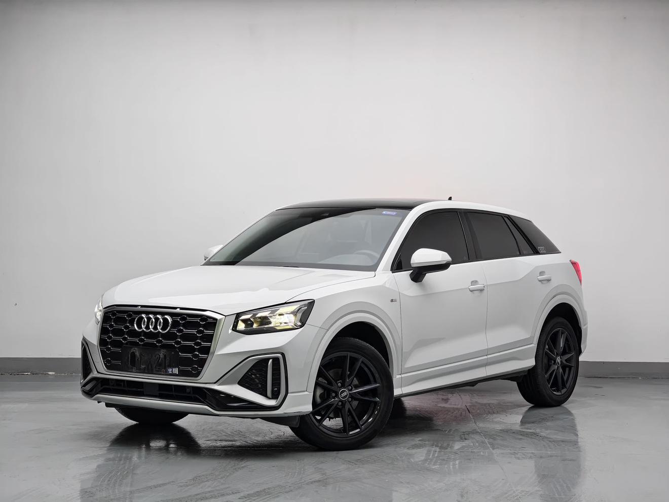 Audi Q2L 2022, 1.4 л турбо, робот (DCT), передний, пробег 28 000 км — авто из Китая с пробегом