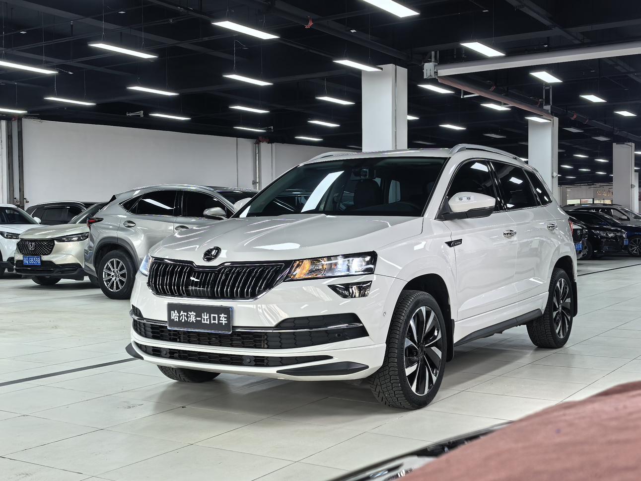 Skoda Karoq 2022, 1.4 л турбо, робот (DCT), передний, пробег 40 000 км — авто из Китая с пробегом