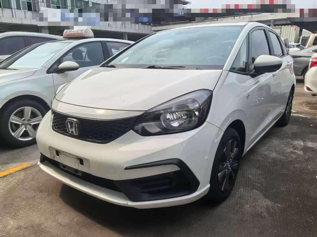 Honda Fit 2022, 1.5 л, вариатор (CVT), передний, пробег 21 000 км — авто из Китая с пробегом