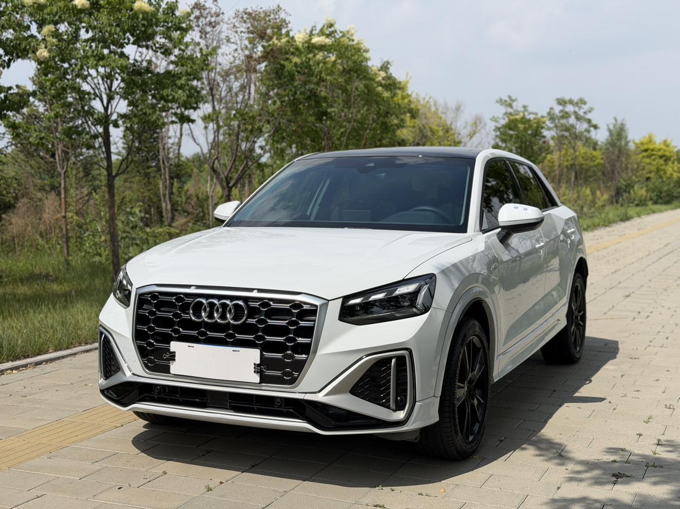 Audi Q2L 2022, 1.4 л турбо, робот (DCT), передний, пробег 45 000 км — авто из Китая с пробегом